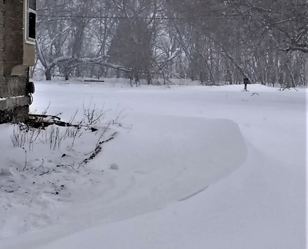 Winter scene with large snowdrift